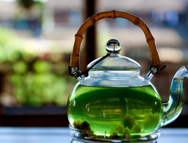 green tea kettle on table.